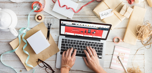 cluttered desk with a laptop