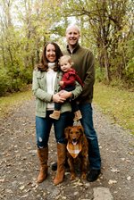 Image of Lauren Kaszonyi and family posing in front of trees. Image provided by Lauren Kaszonyi.